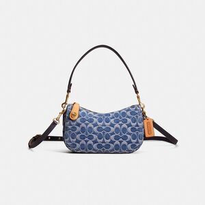 Coach Restored Swinger In Signature Denim